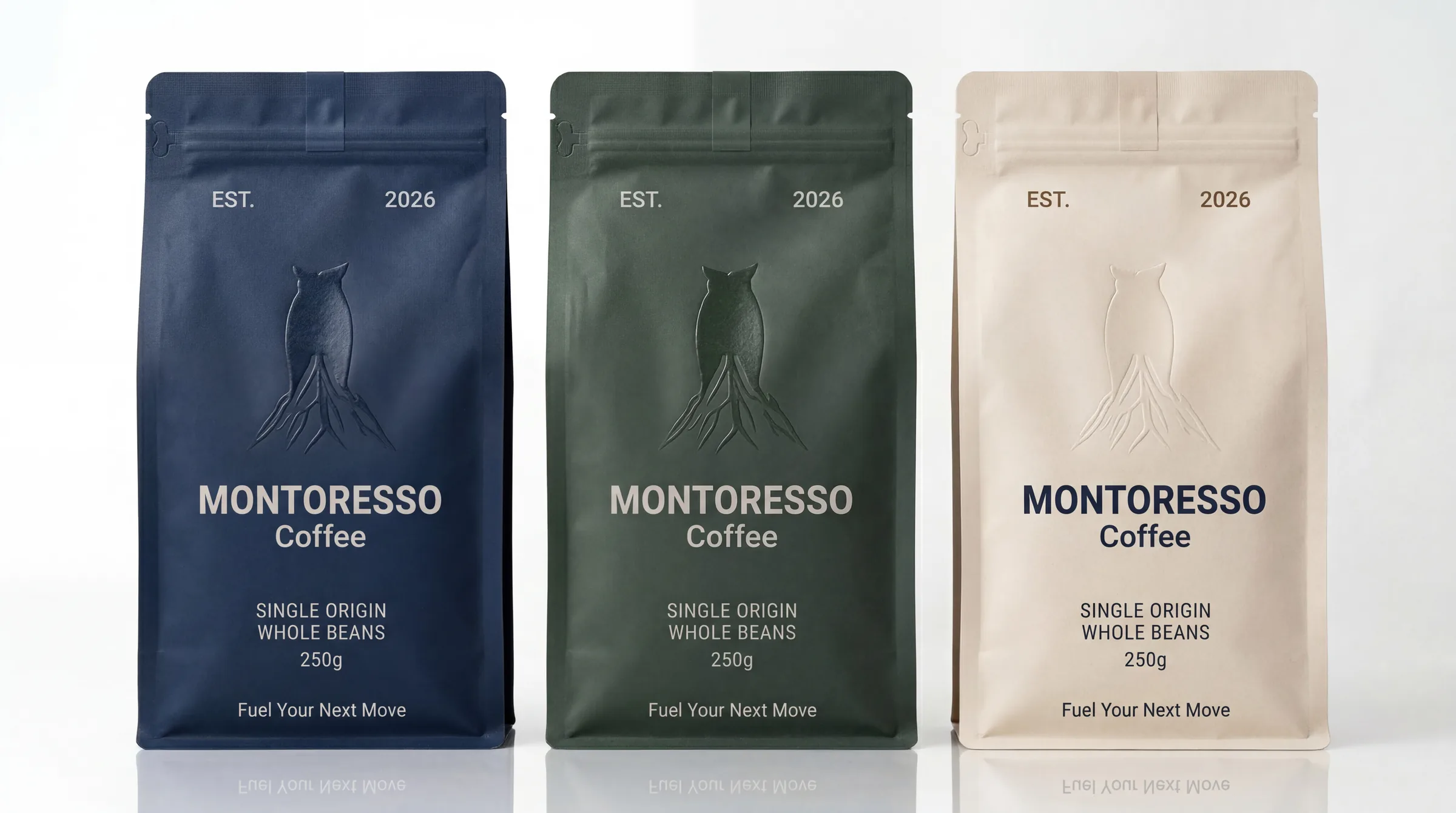 Three Montoresso single origin whole bean coffee bags in navy, green and cream