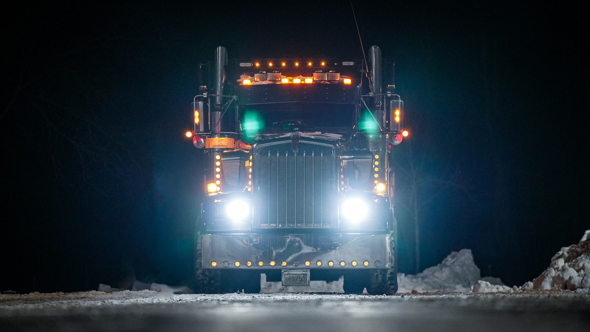 Commercial truck loading snow