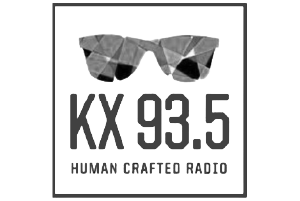 Logo with polygon sunglasses above text 'KX 93.5' and slogan 'Human Crafted Radio' inside a square border.