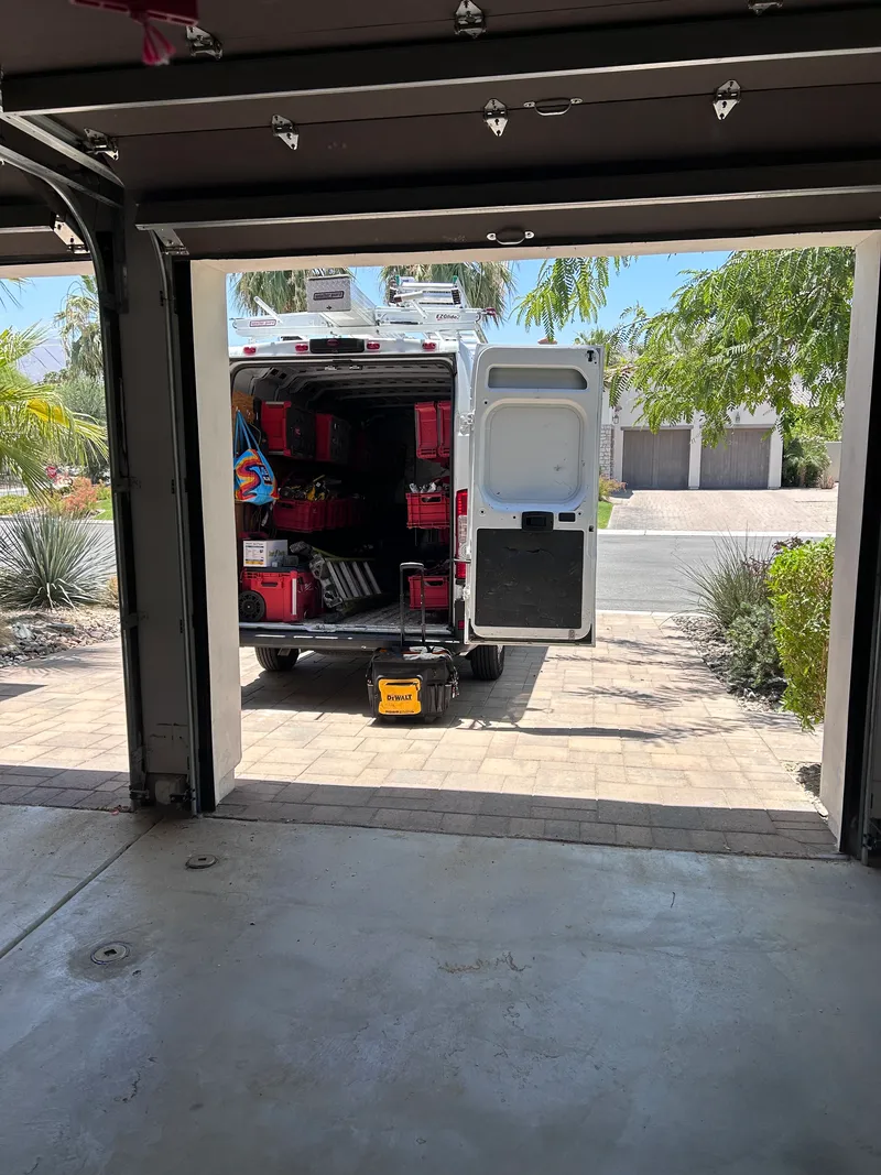 "Elite tankless water heater installation in progress, showcasing precision internal engineering, manifold layout, and master-level utility connections.