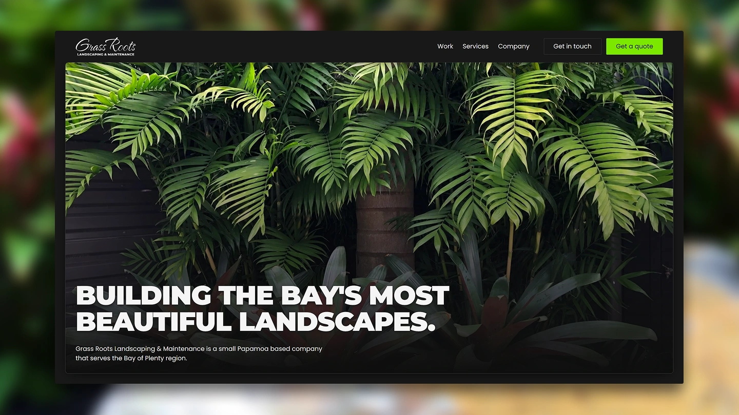 Website header with lush green plants and text promoting Bay’s beautiful landscapes by Grass Roots Landscaping.