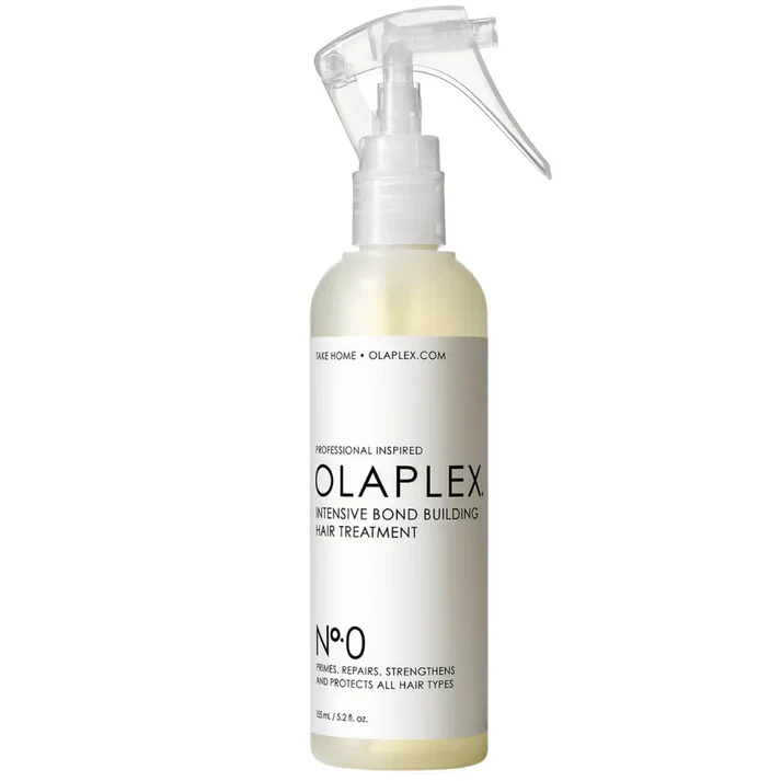 White bottle of Milbon Creative Style Texturizing Sea Mist with black spray cap.