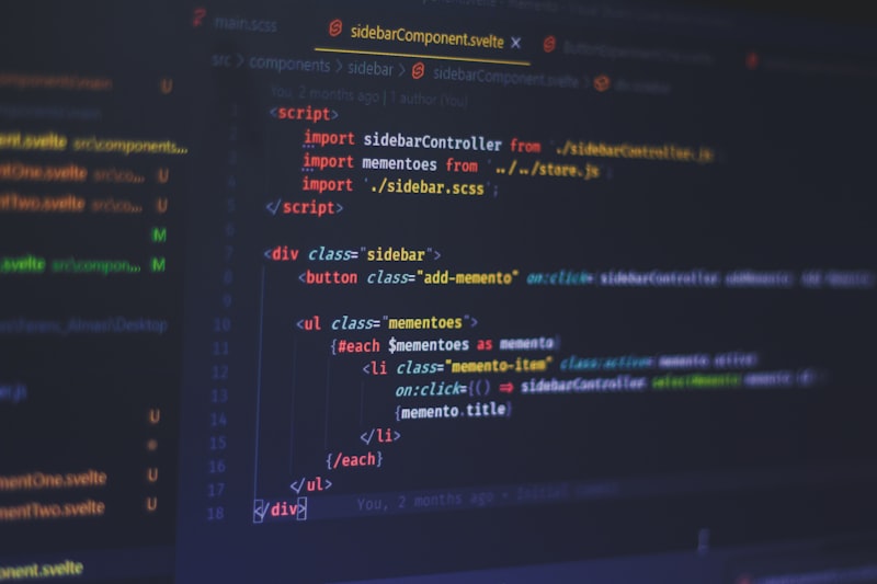 Webflow developer working on laptop
