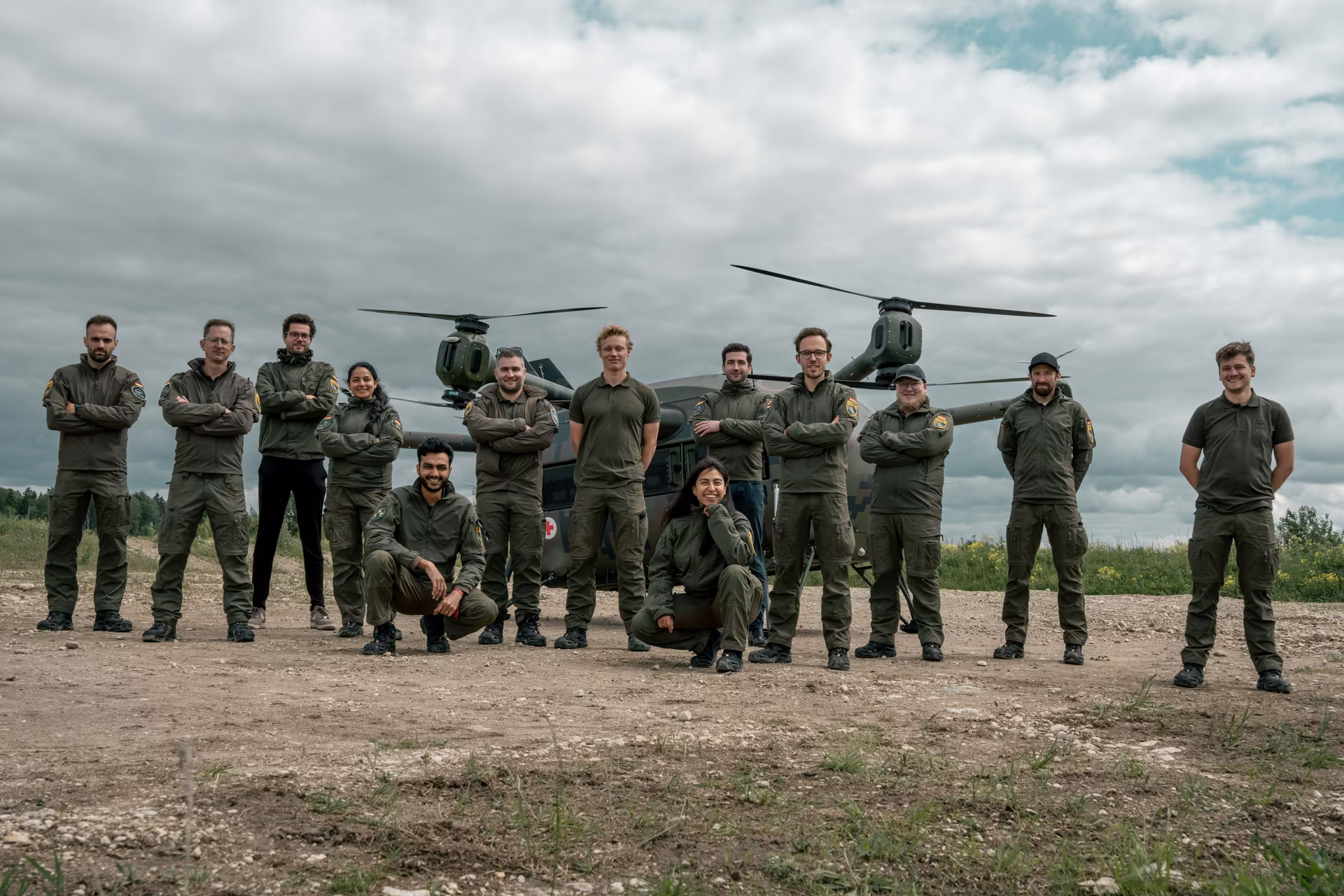 Avilus team in field uniform posing on a training ground