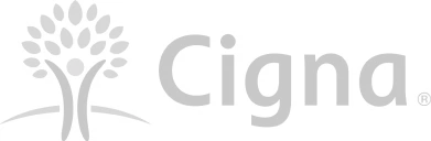 Cigna logo with stylized tree symbol and company name in gray font.
