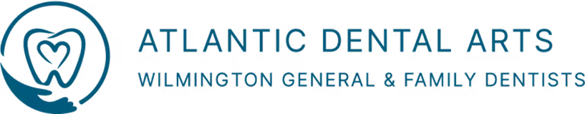 Logo of Atlantic Dental Arts with a tooth and heart graphic and text for Wilmington general and family dentists.