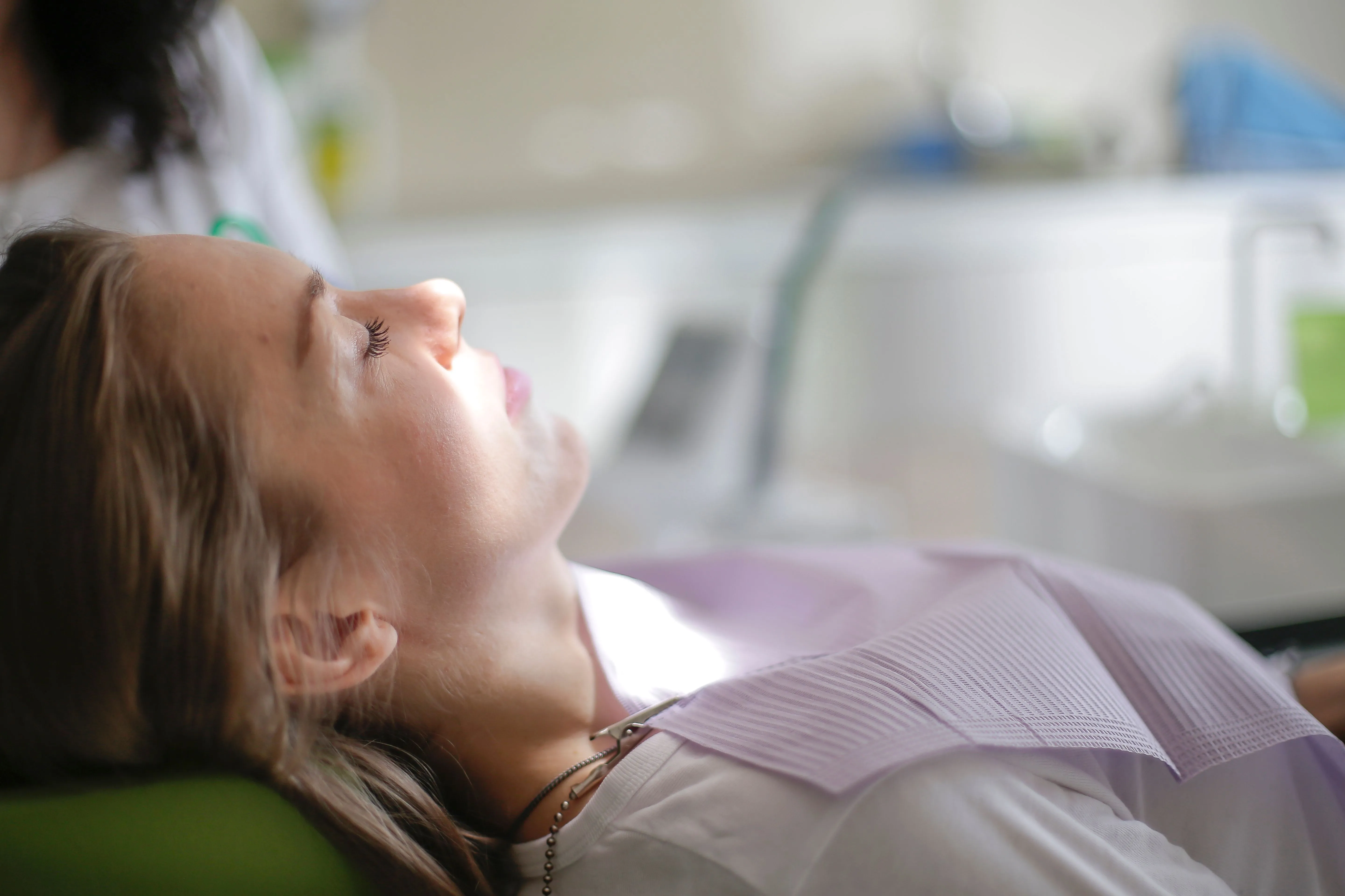 Patient recovering after dental implant surgery