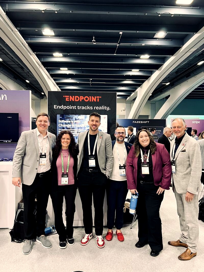 The Endpoint team at a trade show booth