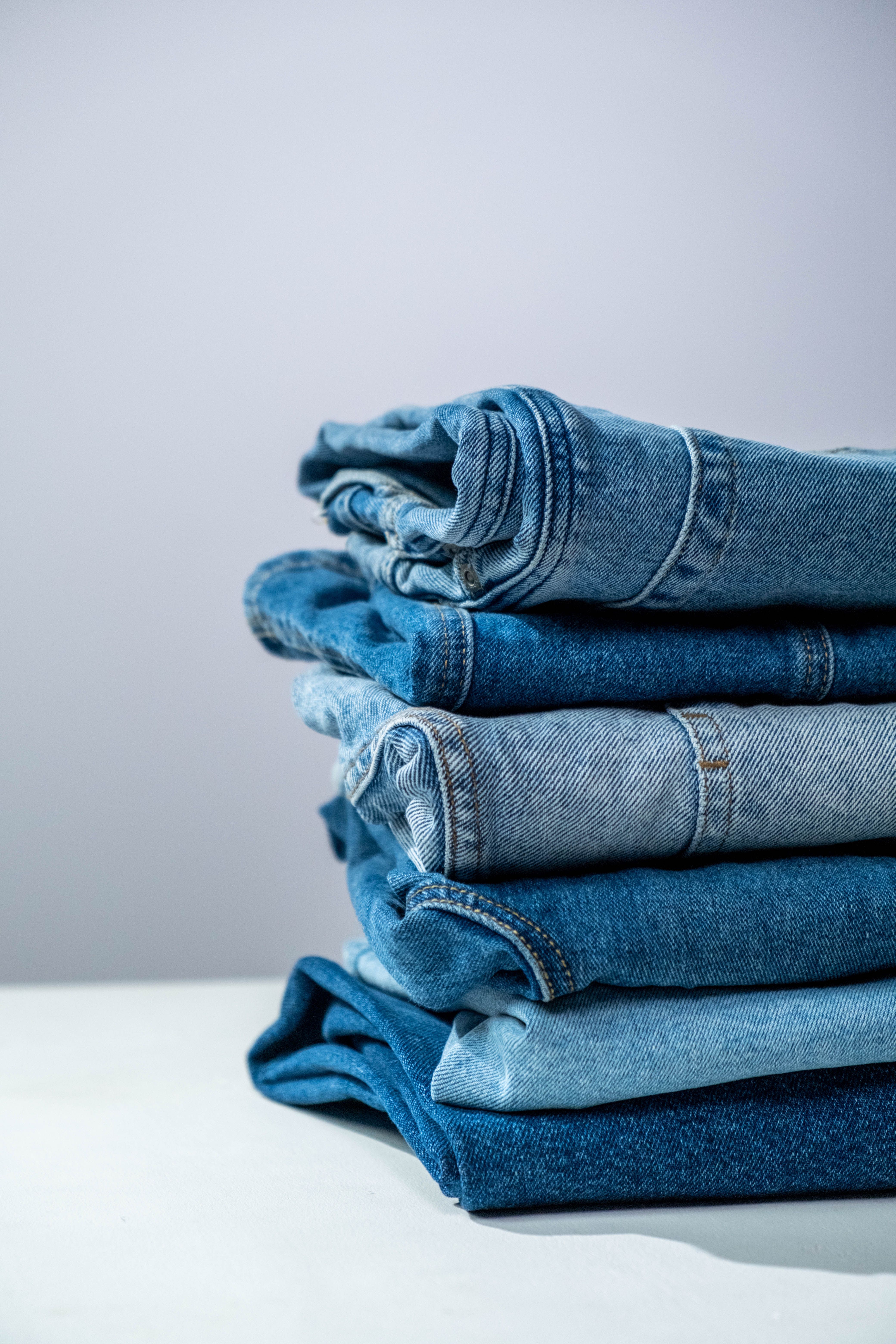 clean folded laundry, household folded clothes, denim