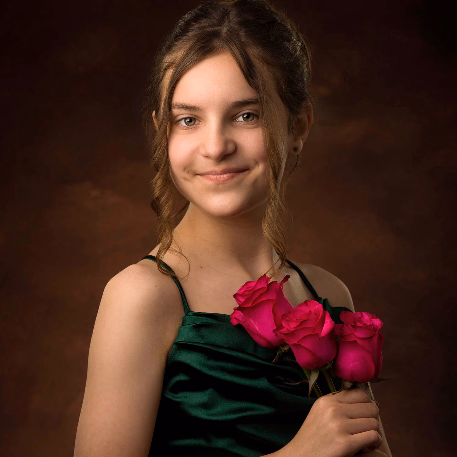 Timeless studio color portrait of a young girl against a simple background by Plano children's photographer Larry Lourcey.