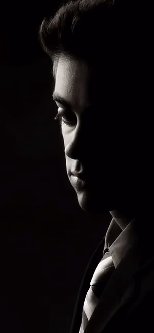 Dramatic senior portrait by Plano photographer Larry Lourcey