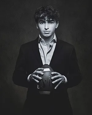 Senior portrait of football player by Lourcey Photography