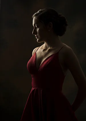 Dramatically lit senior portrait of a girl by Lourcey Photography