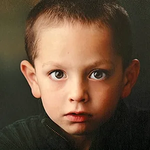 studio portrait of young boy