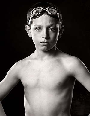 Dramatic black and white portrait of a swimmer