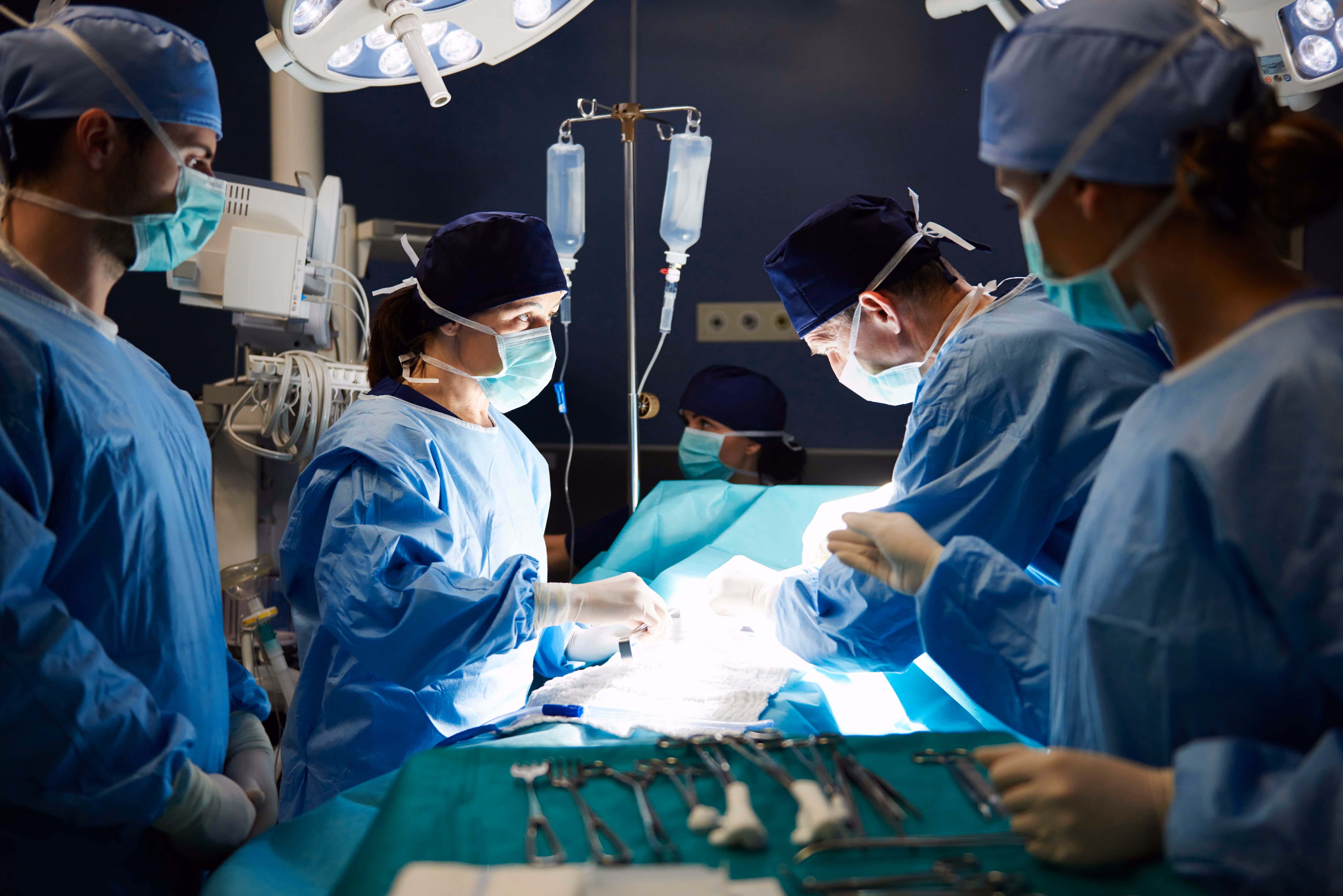 Surgical team working in an operating theatre.