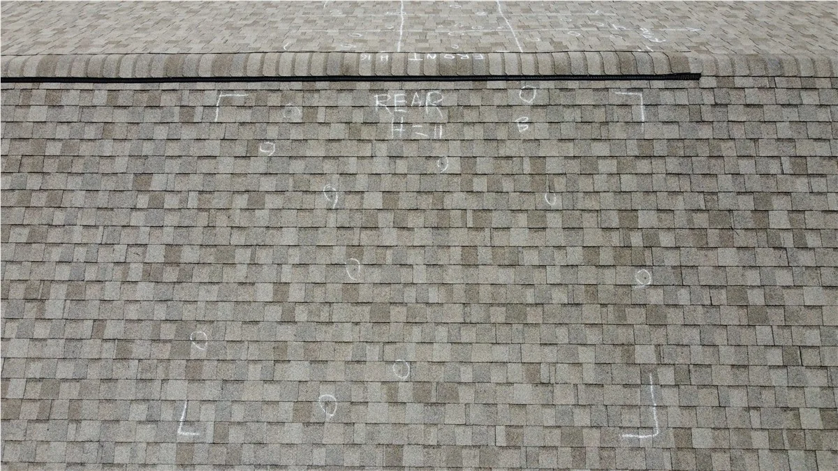 Close-up of architectural asphalt shingles on a JTO roof repair