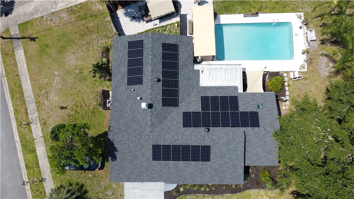 Front view of a Florida home with rooftop solar panels