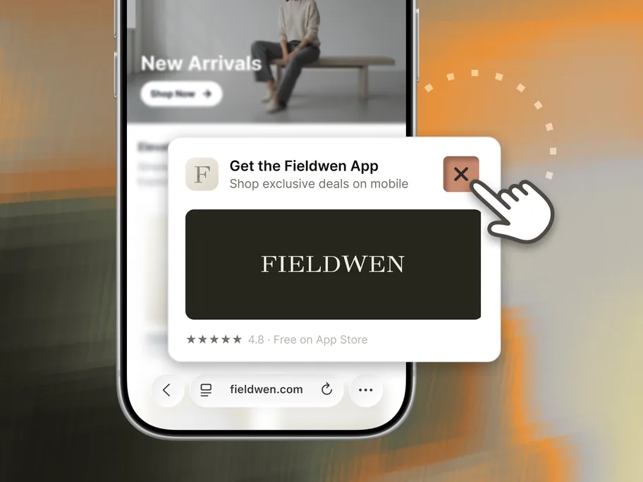 Mobile shop page with a Get the Fieldwen App download popup being dismissed by a cursor.