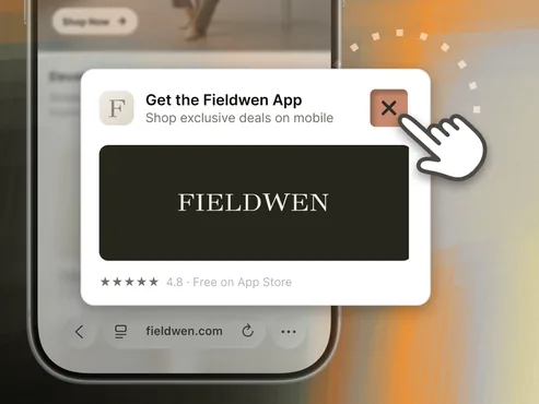 Mobile shop page with a Get the Fieldwen App download popup being dismissed by a cursor.
