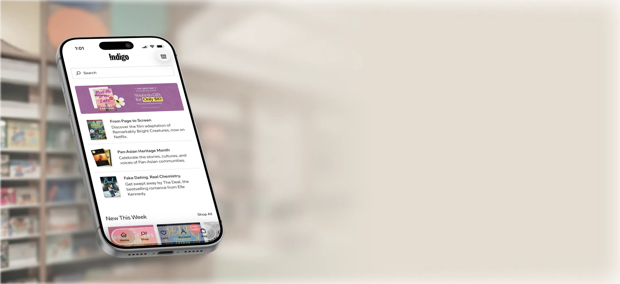 Indigo app on iPhone in a bookstore