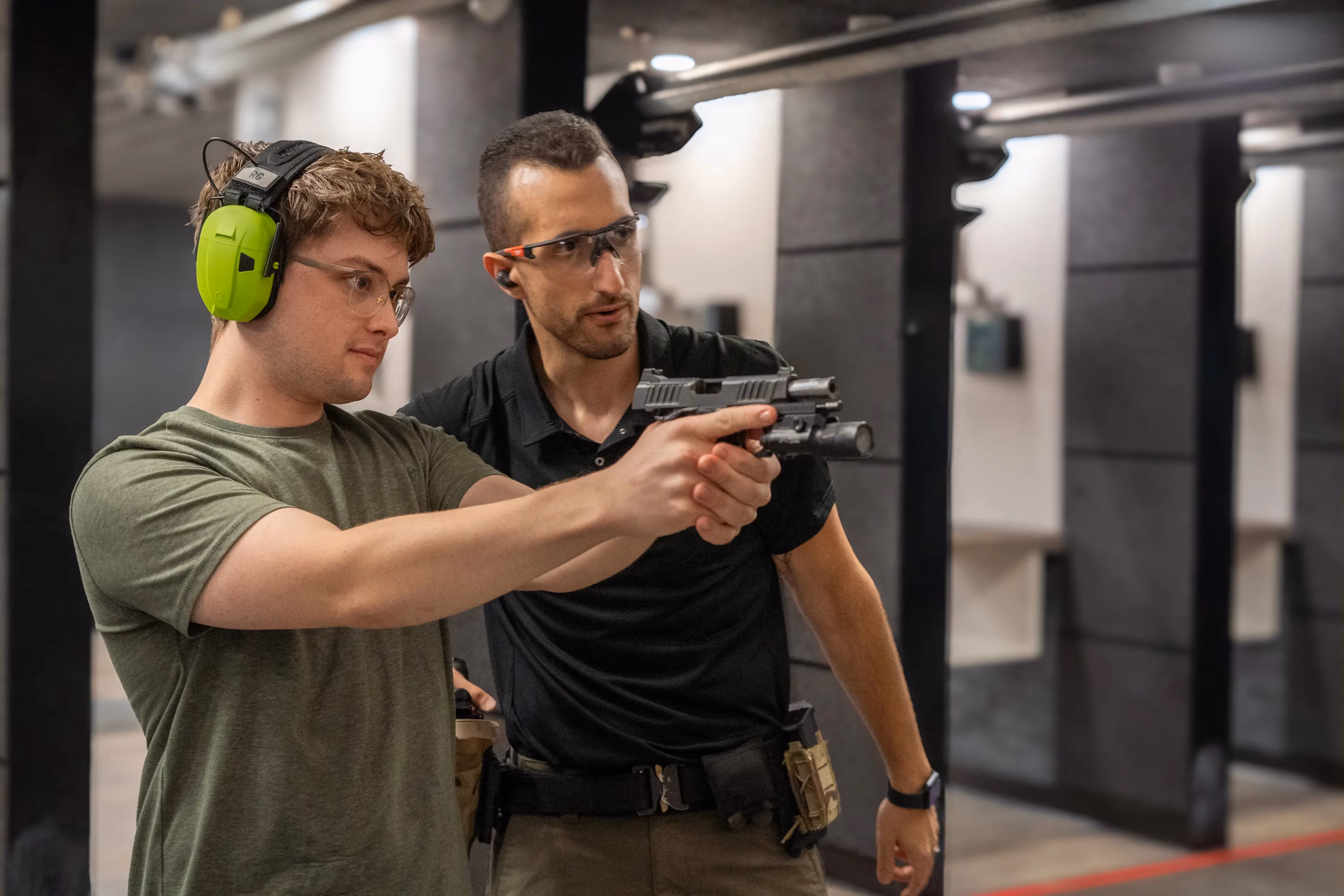 Beginner firearms lesson with a Liberty for All Training instructor at a DFW indoor range