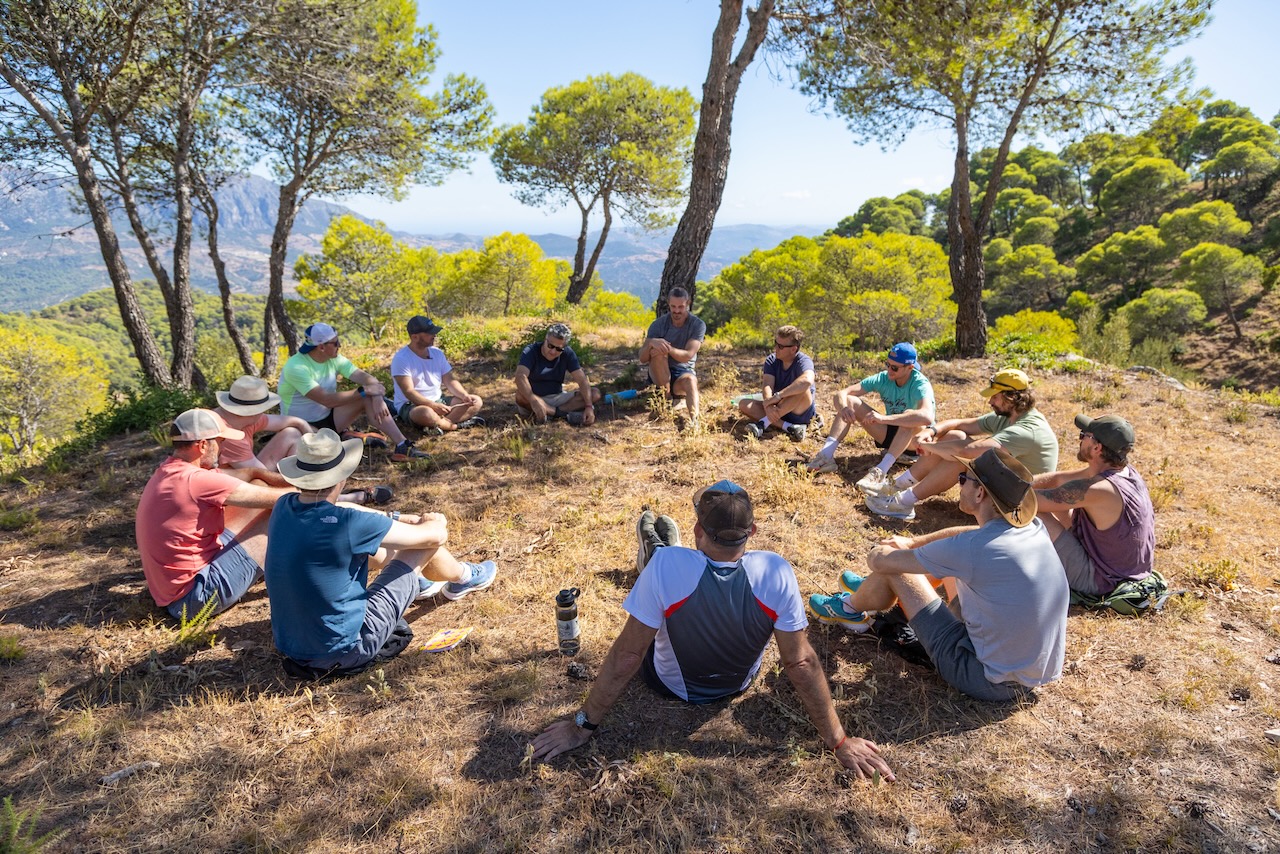 Monumental members gathered in an open field