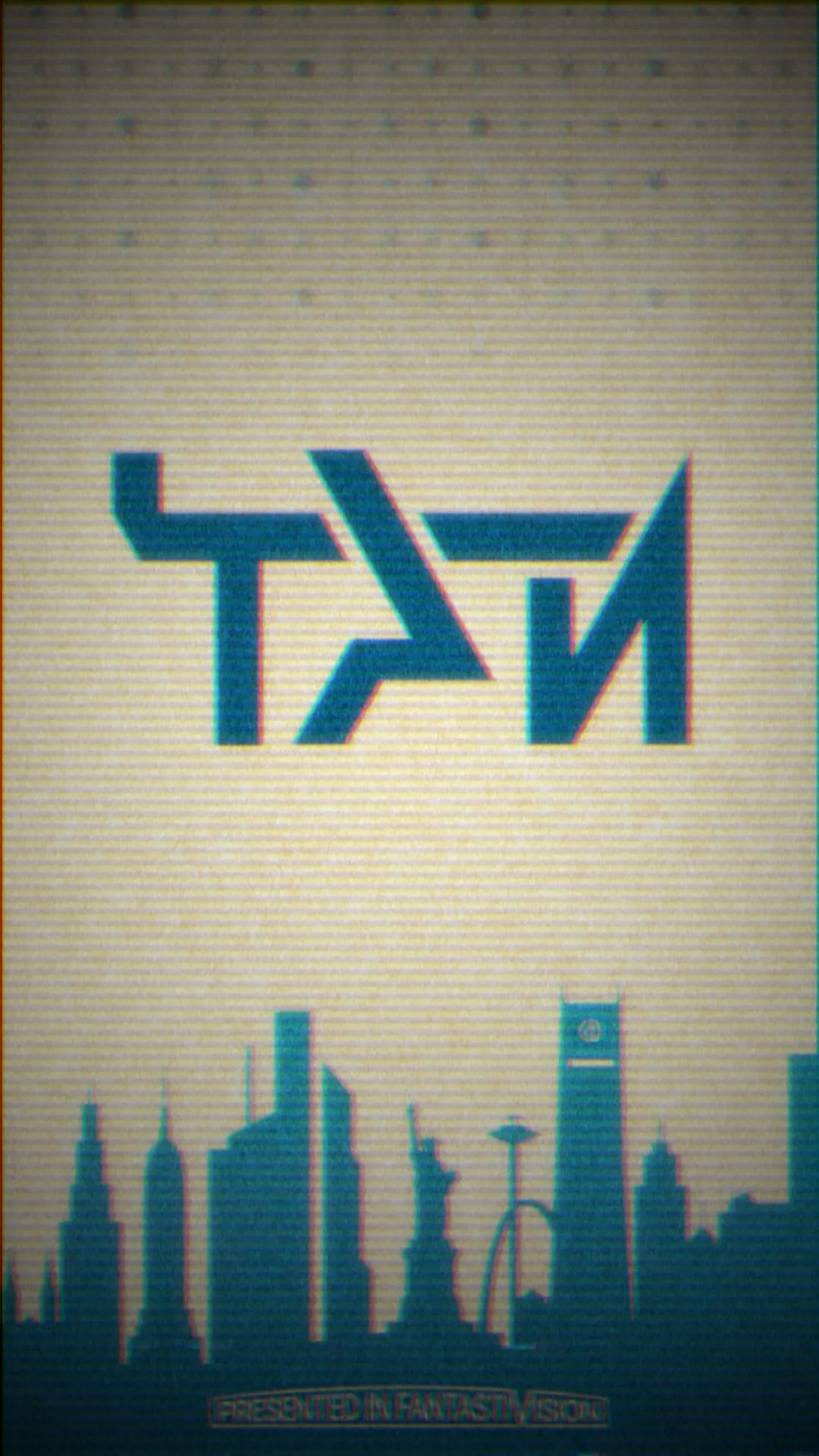 Animation frame showing the angular TAN monogram in teal above a New York skyline silhouette, with a line reading presented in Fantastivision along the base.