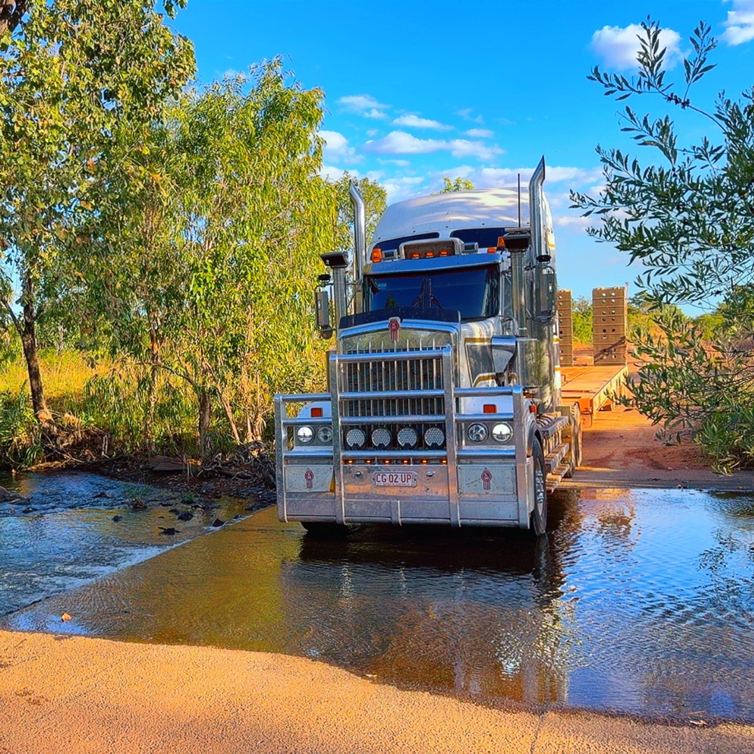 Road train crossing a creek in the Northern Territory, NT Broadacre transport
