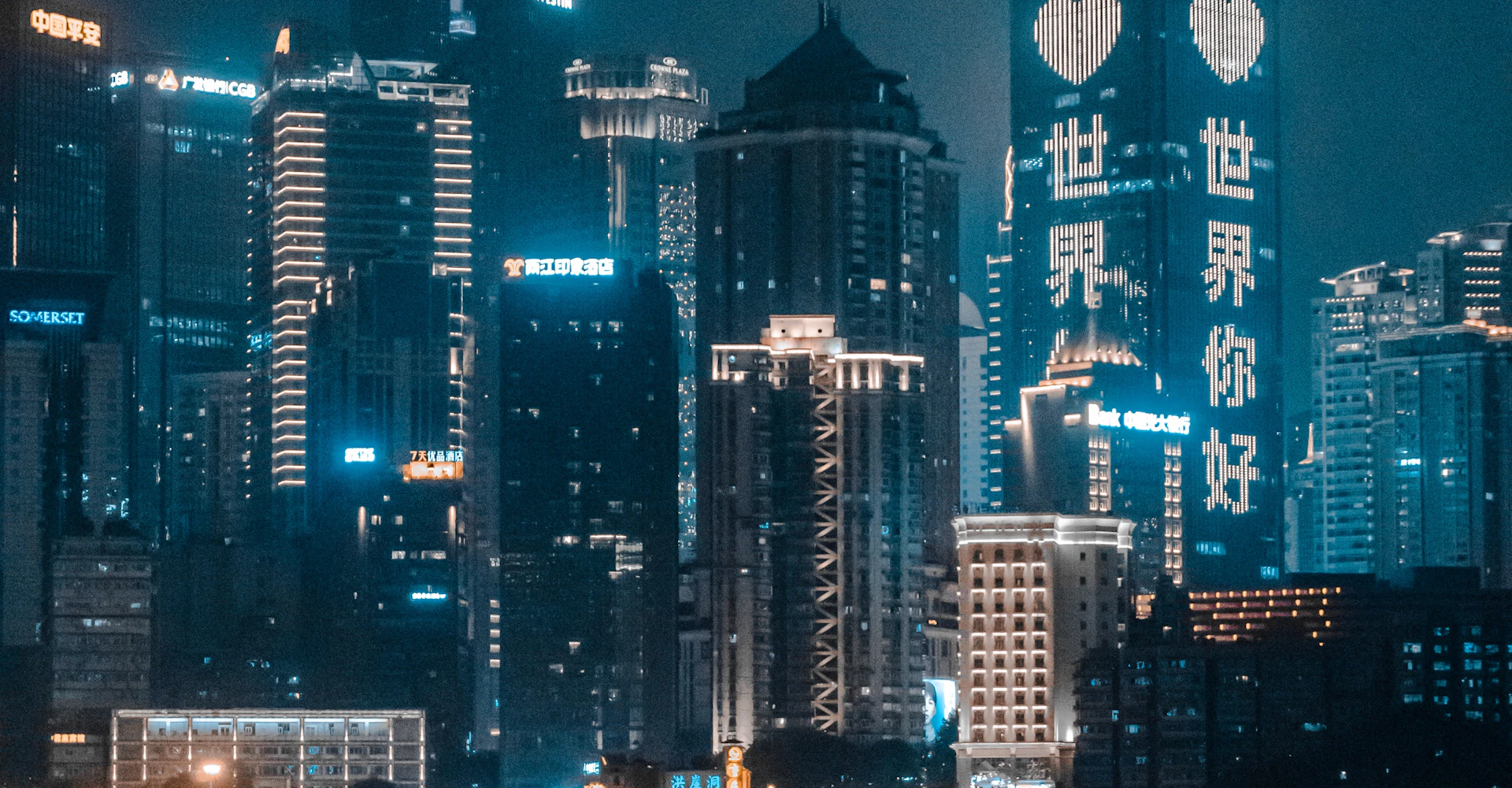 Chongqing buildings beside the river at night