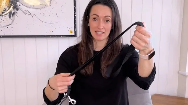 Katie holding up a dog lead