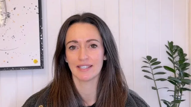 Katie sat in front of camera