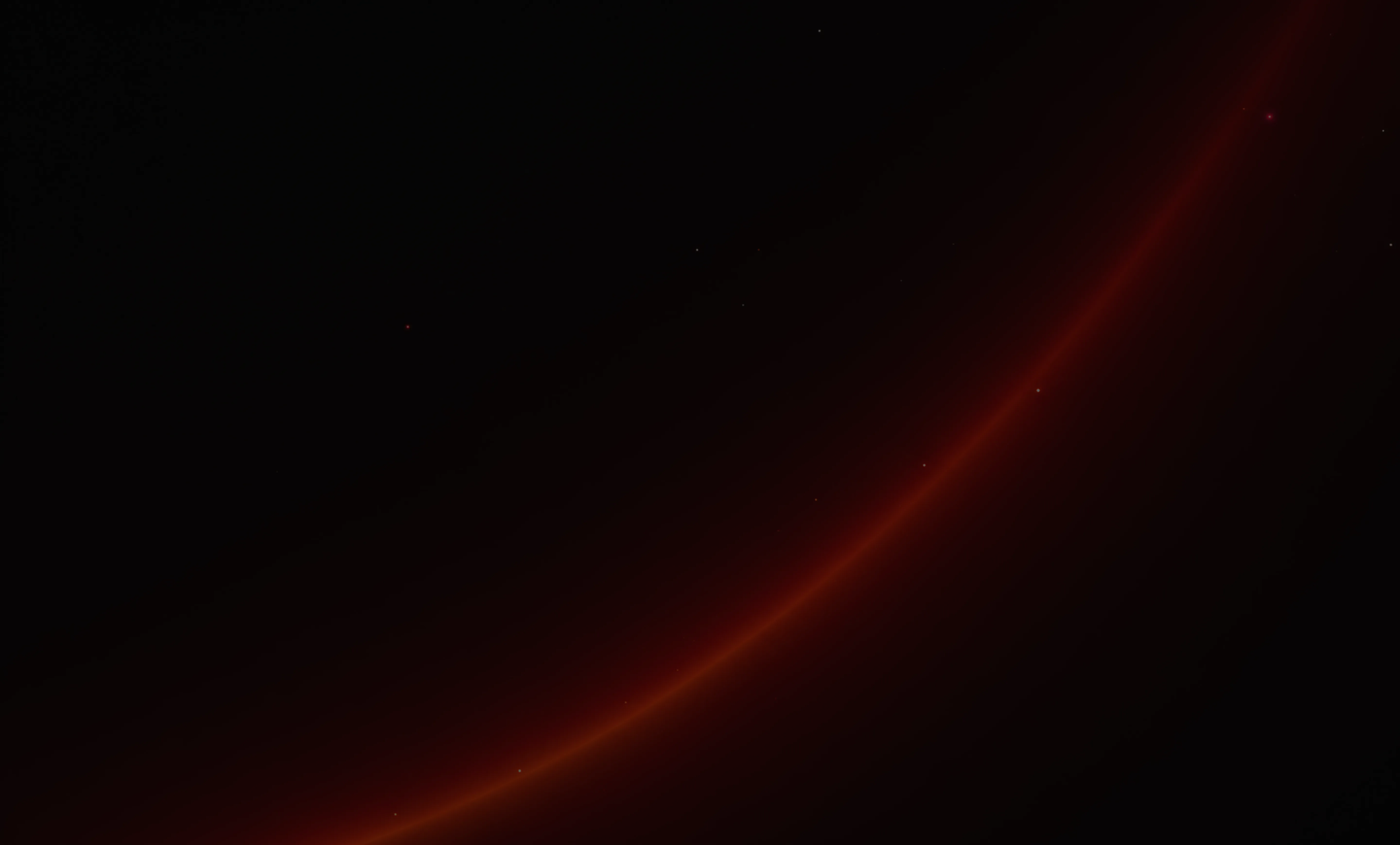 Faint curved orange-red light streak on a dark black background with small scattered light dots.
