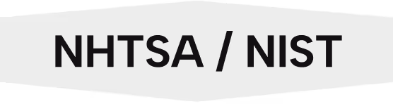 Text displaying 'NHTSA / NIST' in dark letters on a black background.