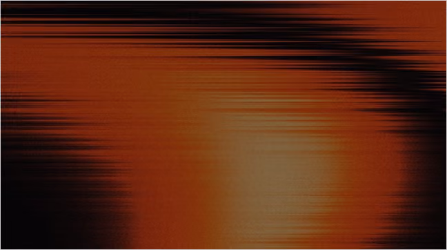 Abstract blurred lines in shades of dark red, orange, and black creating a horizontal streaked pattern suggesting motion or digital distortion.