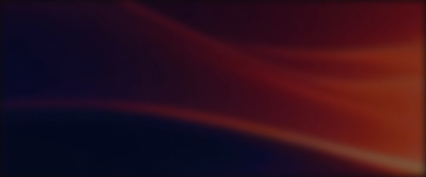 Abstract background featuring smooth, flowing gradients blending dark blue and deep red tones.