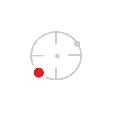 Gray circular radar screen with four crosshair lines, a small gray dot near the upper right, and a larger red dot near the lower left inside a white circular background.