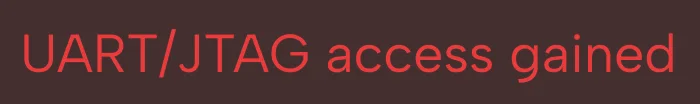Red text on black background reading 'UART/JTAG access gained'.