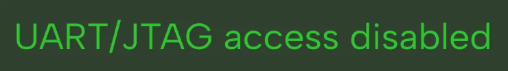 Green text on a black background reading 'UART/JTAG access disabled'.