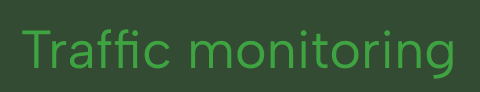 Green text reading 'Traffic monitoring' on a dark background.
