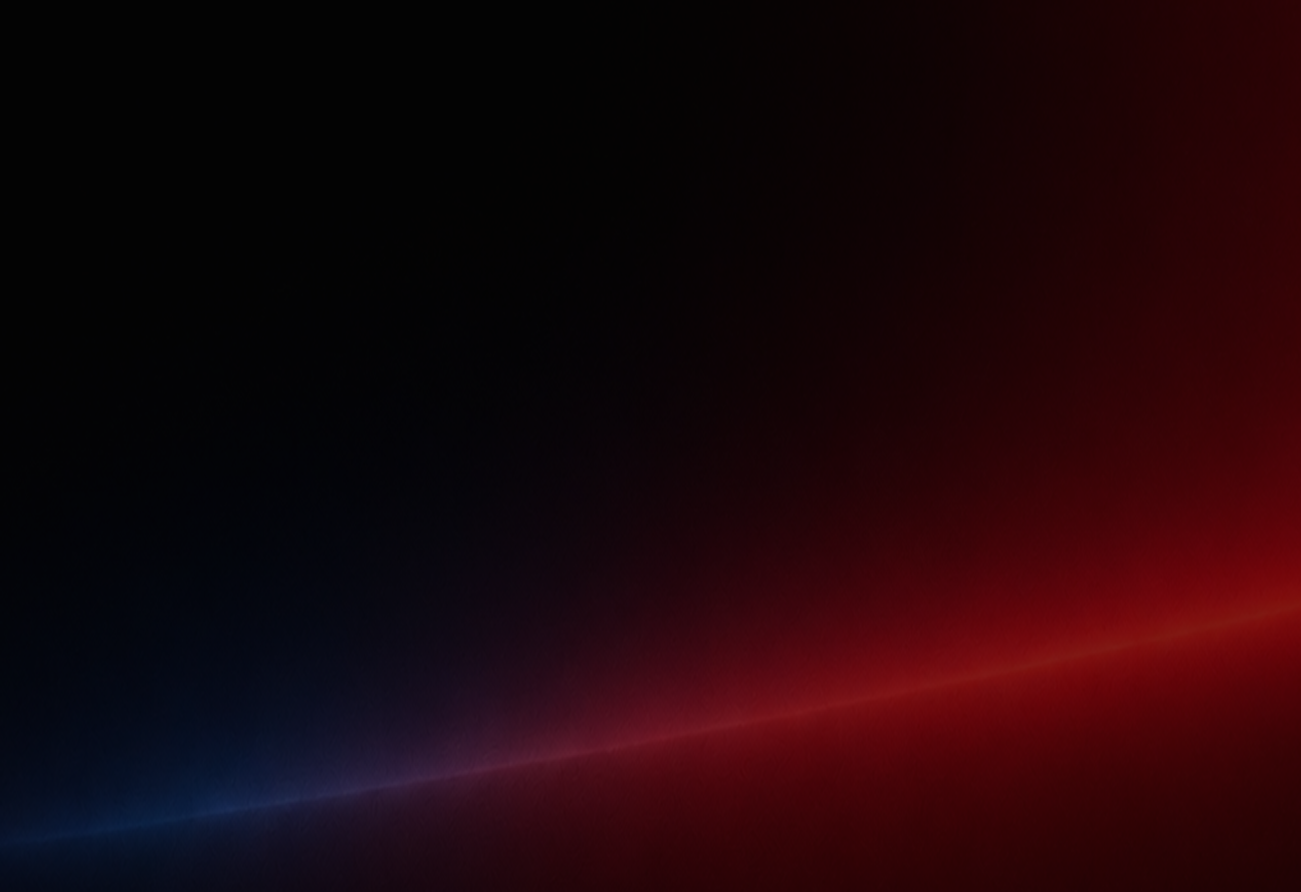 Gradient background with smooth transition from dark blue on the lower left to deep red on the lower right, blending into black at the top.