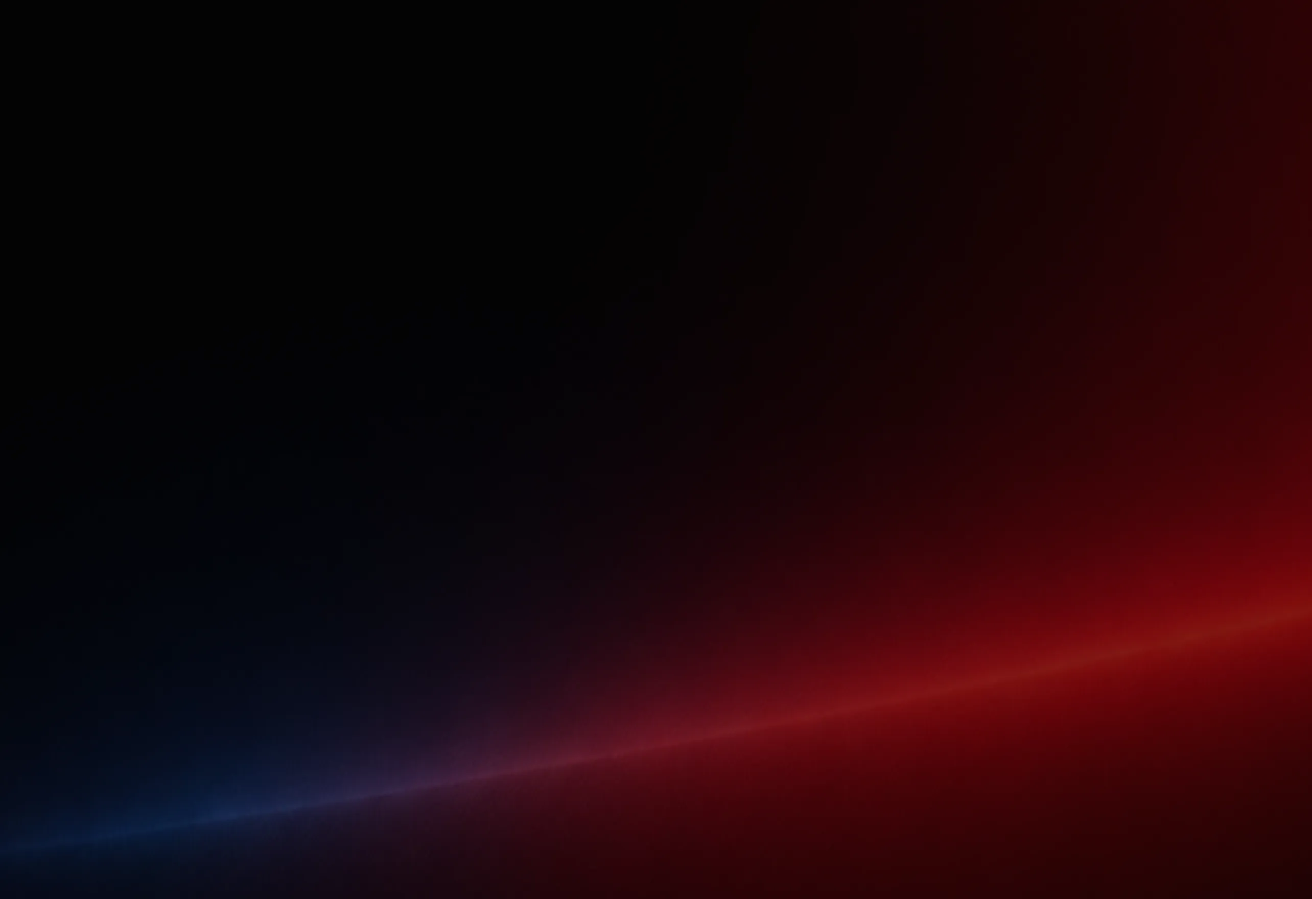 Gradient background with smooth transition from dark blue on the lower left to deep red on the lower right, blending into black at the top.