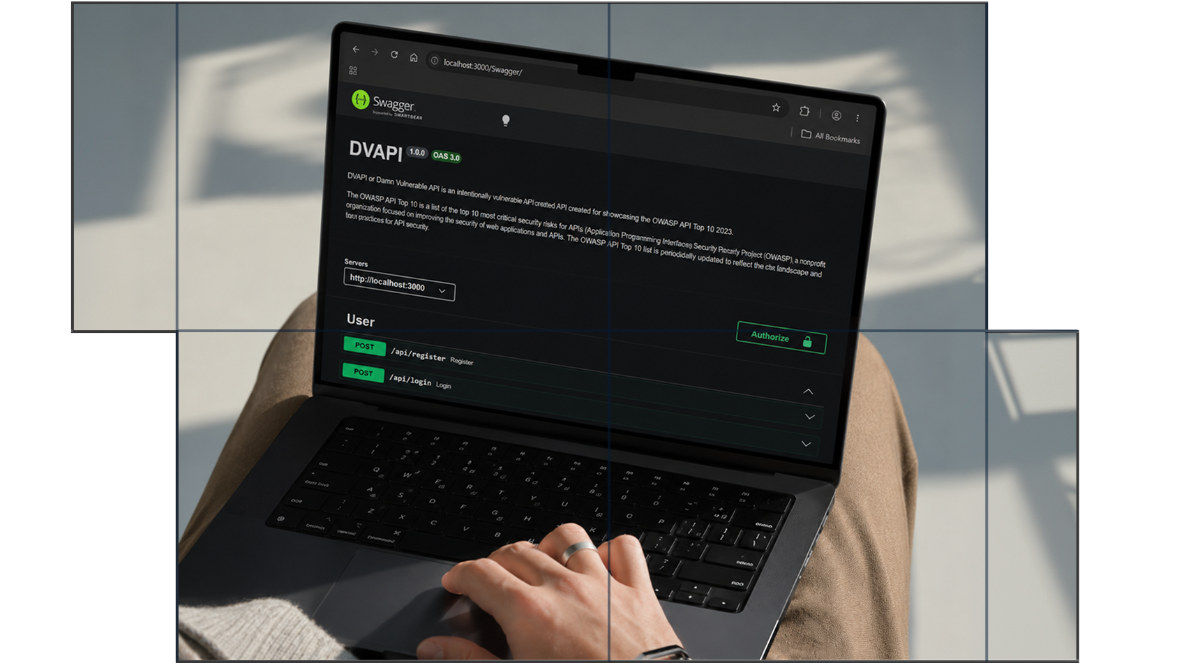 Person's hand resting on a laptop keyboard showing a dark-themed Swagger API documentation page for DVAPI, an intentionally vulnerable API, with endpoints for user registration and login visible.
