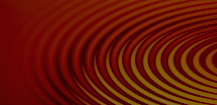 Abstract image of concentric circular wave patterns in red and yellow gradient colors, creating a ripple effect.