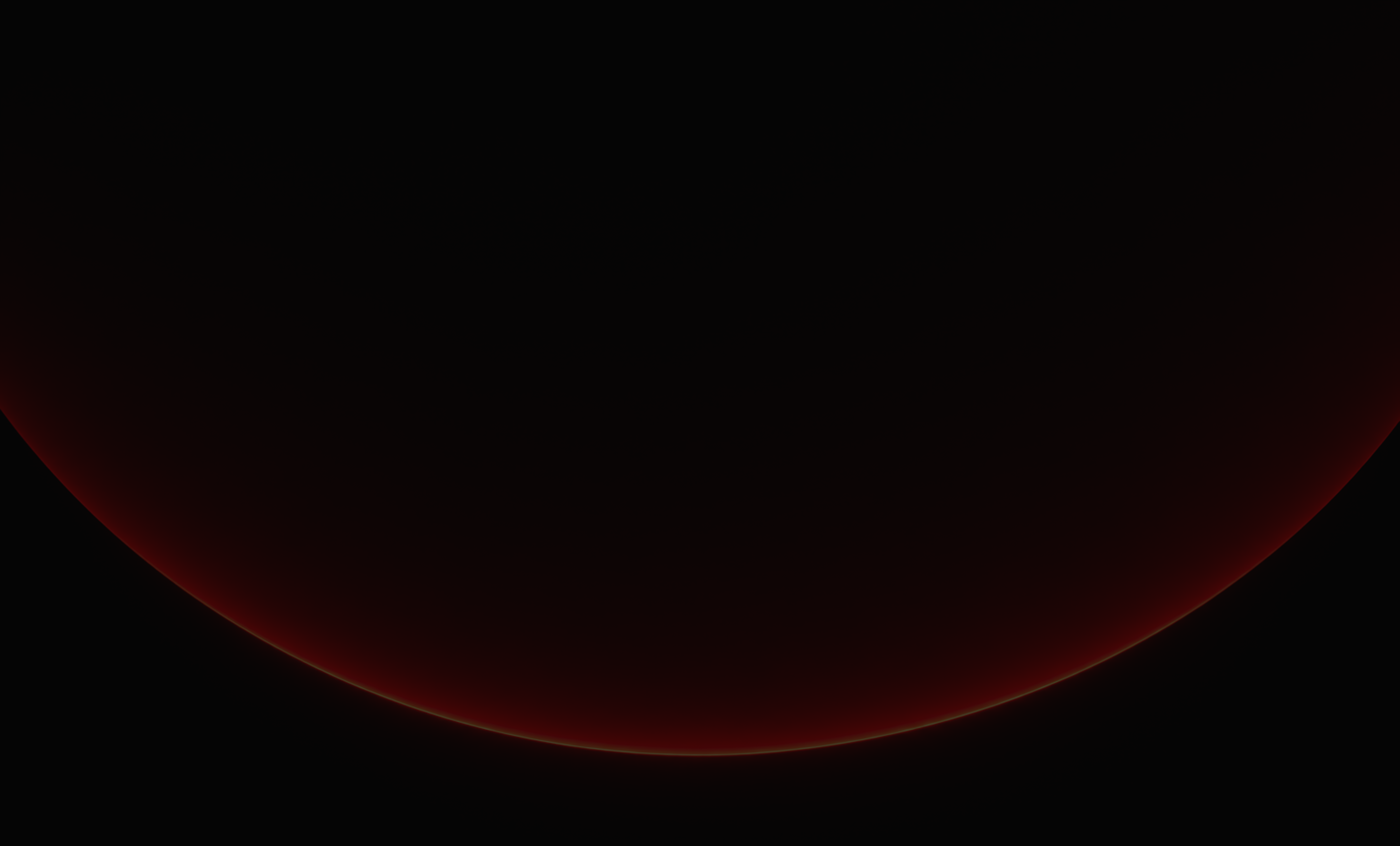 A dark curved shape with a faint red glow along its edge on a black background.