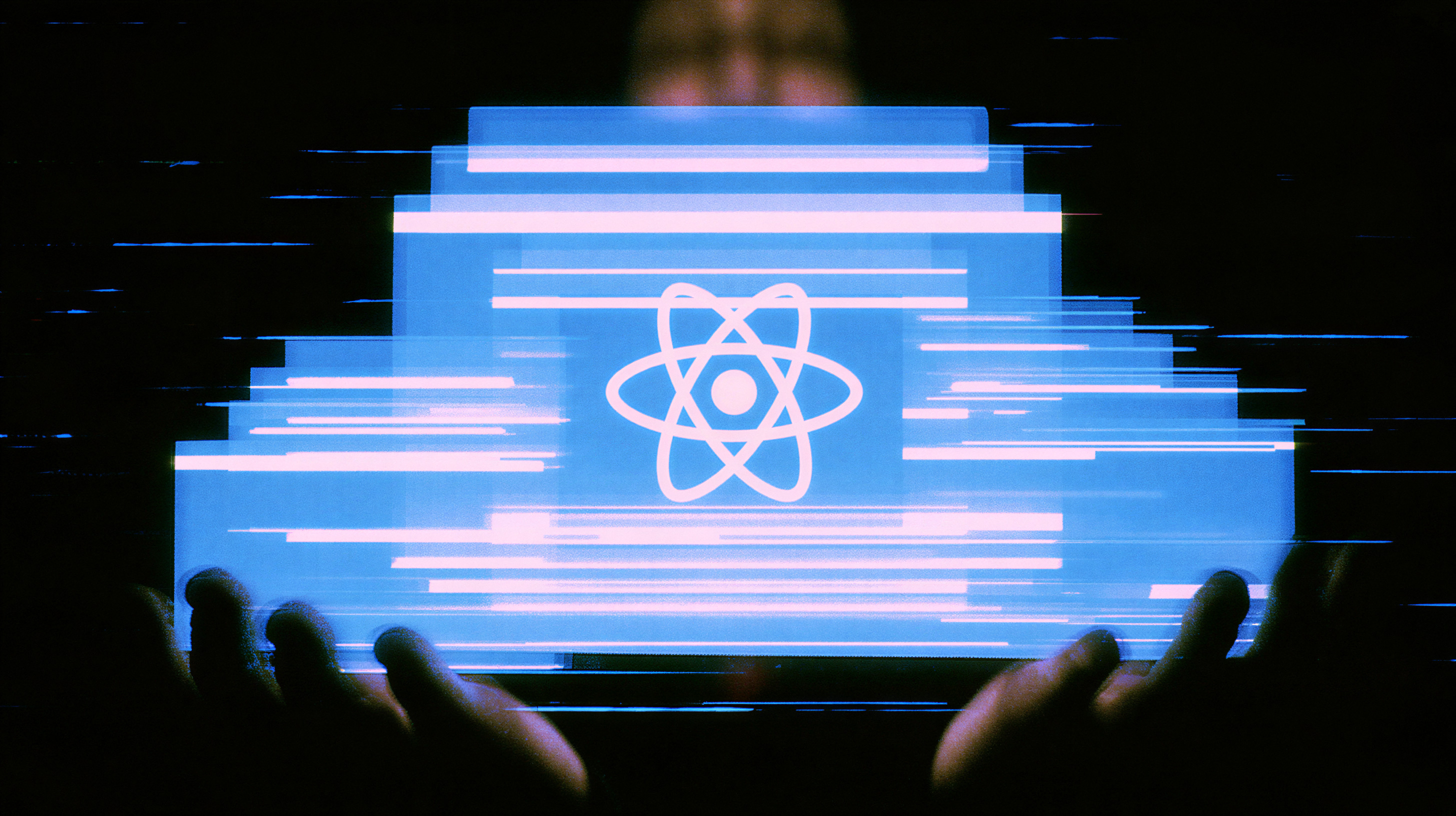 Glowing blue holographic cloud icon with an atomic symbol in the center, held above hands against a dark background with motion blur lines.