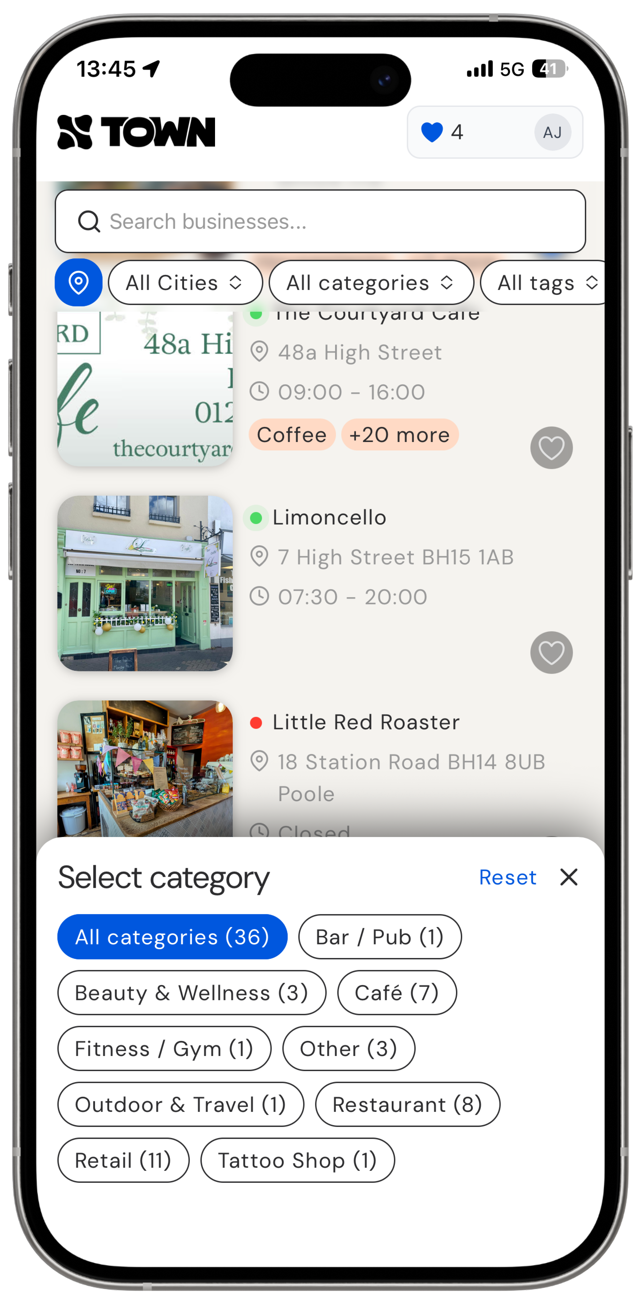 Mobile app screen showing a business search interface named Town with filters for cities, categories, and tags. It lists businesses including The Courtyard Cafe, Limoncello, and Little Red Roaster with addresses, hours, and status indicated by colored dots. A category selection menu is open at the bottom with options like Bar/Pub, Beauty & Wellness, Café, Fitness/Gym, Other, Outdoor & Travel, Restaurant, Retail, and Tattoo Shop, displaying the number of listings in parentheses for each category.
