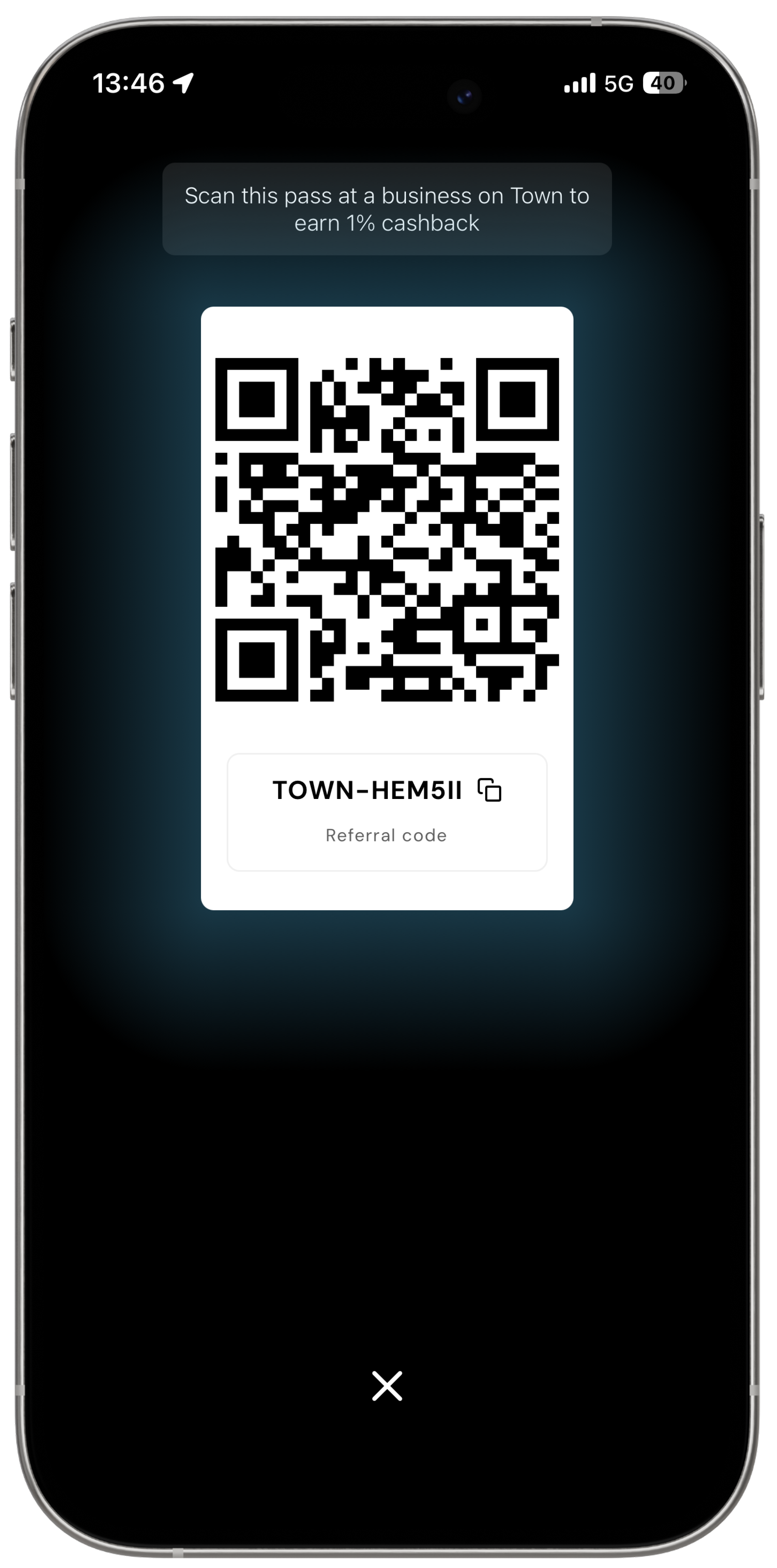 Smartphone screen displaying a QR code labeled with the referral code 'TOWN-HEM5II' and a prompt to scan the pass at a business on Town to earn 1% cashback.