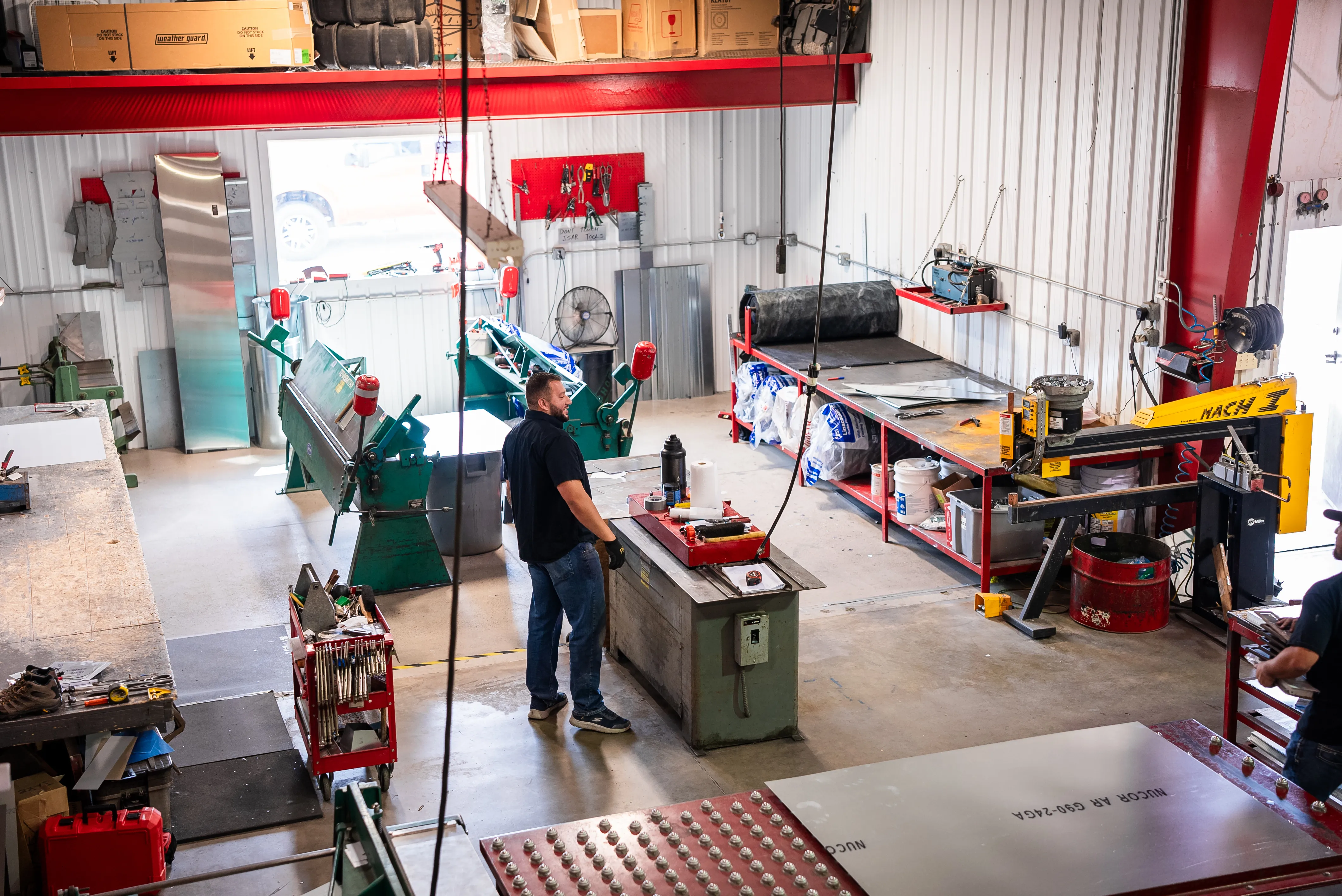 Technician installing residential heating and cooling equipment