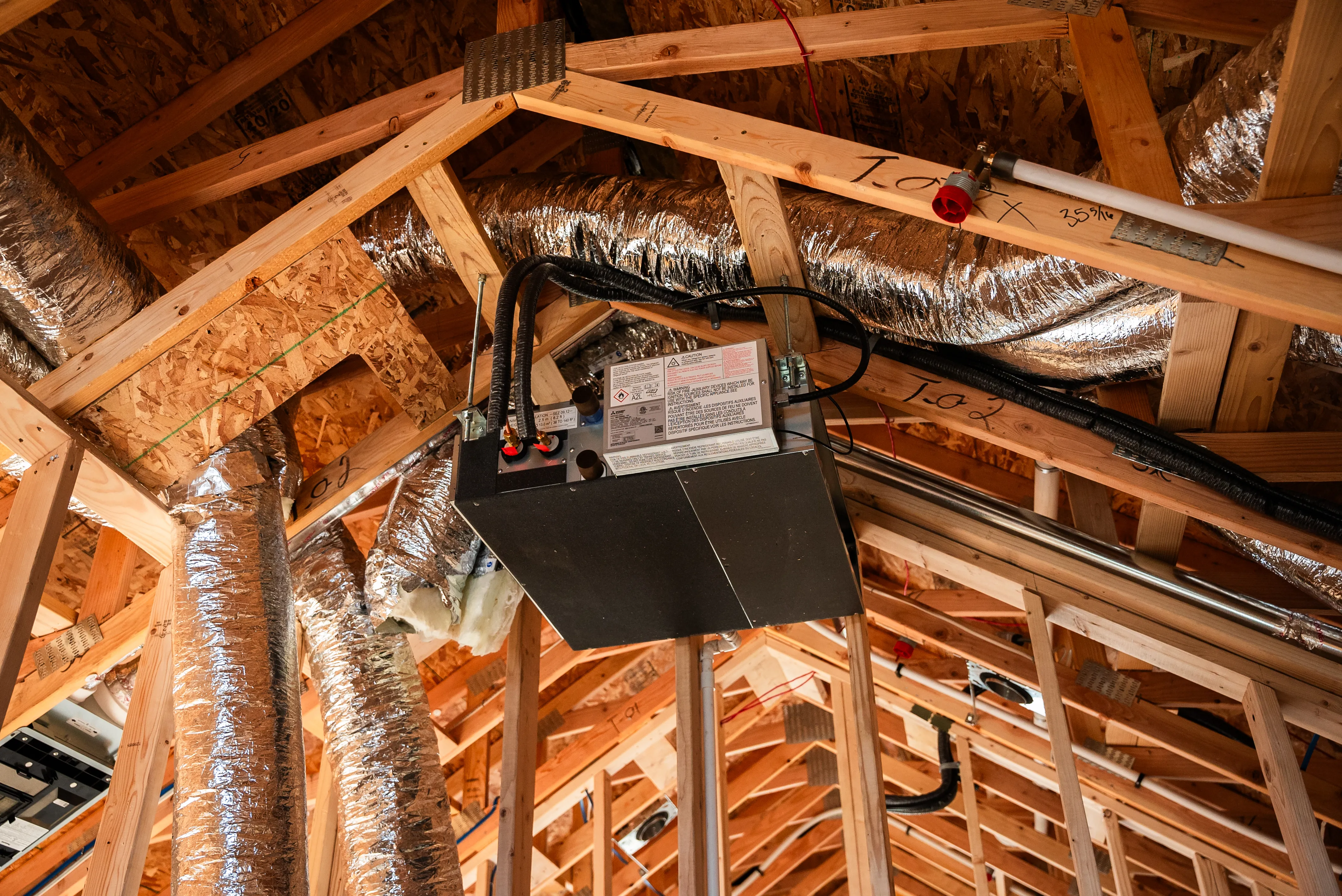 Snipps Heating & Air Conditioning crew member at a service call